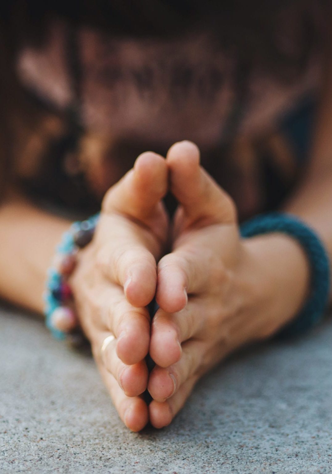 Woman hands together symbolizing prayer and gratitude. Mudra. Yoga concept.